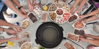What are the reasons for consuming steamboat food?
